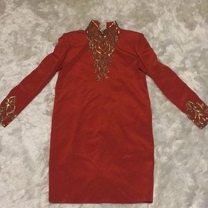 Vintage Oleg Cassini burnt orange colored dress